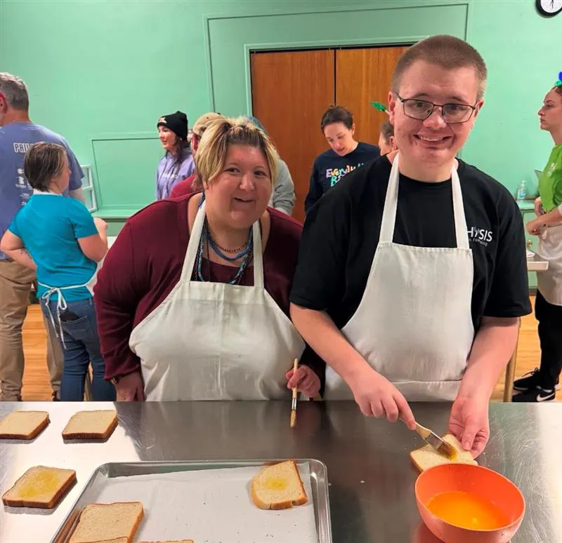 buddy chefs cooking at event