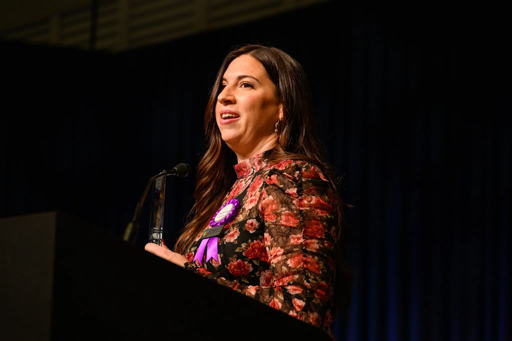 Lindley speaking at event